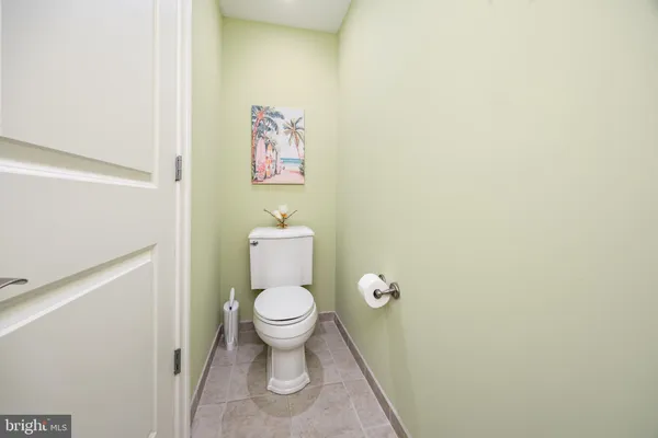 a white bath tub sitting in a bathroom