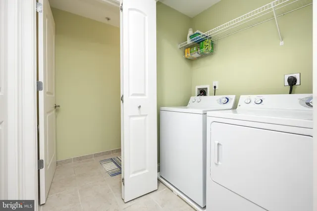 a white bath tub sitting in a bathroom