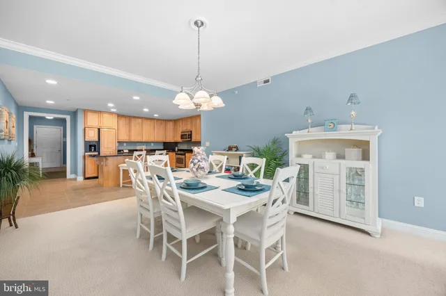a living room with furniture large window and a flat screen tv