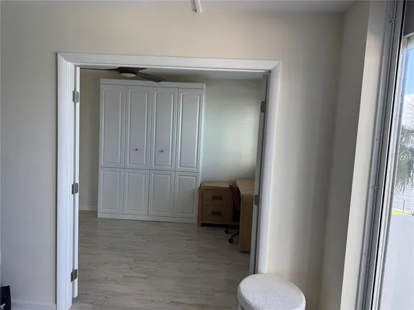 a view of a room and window