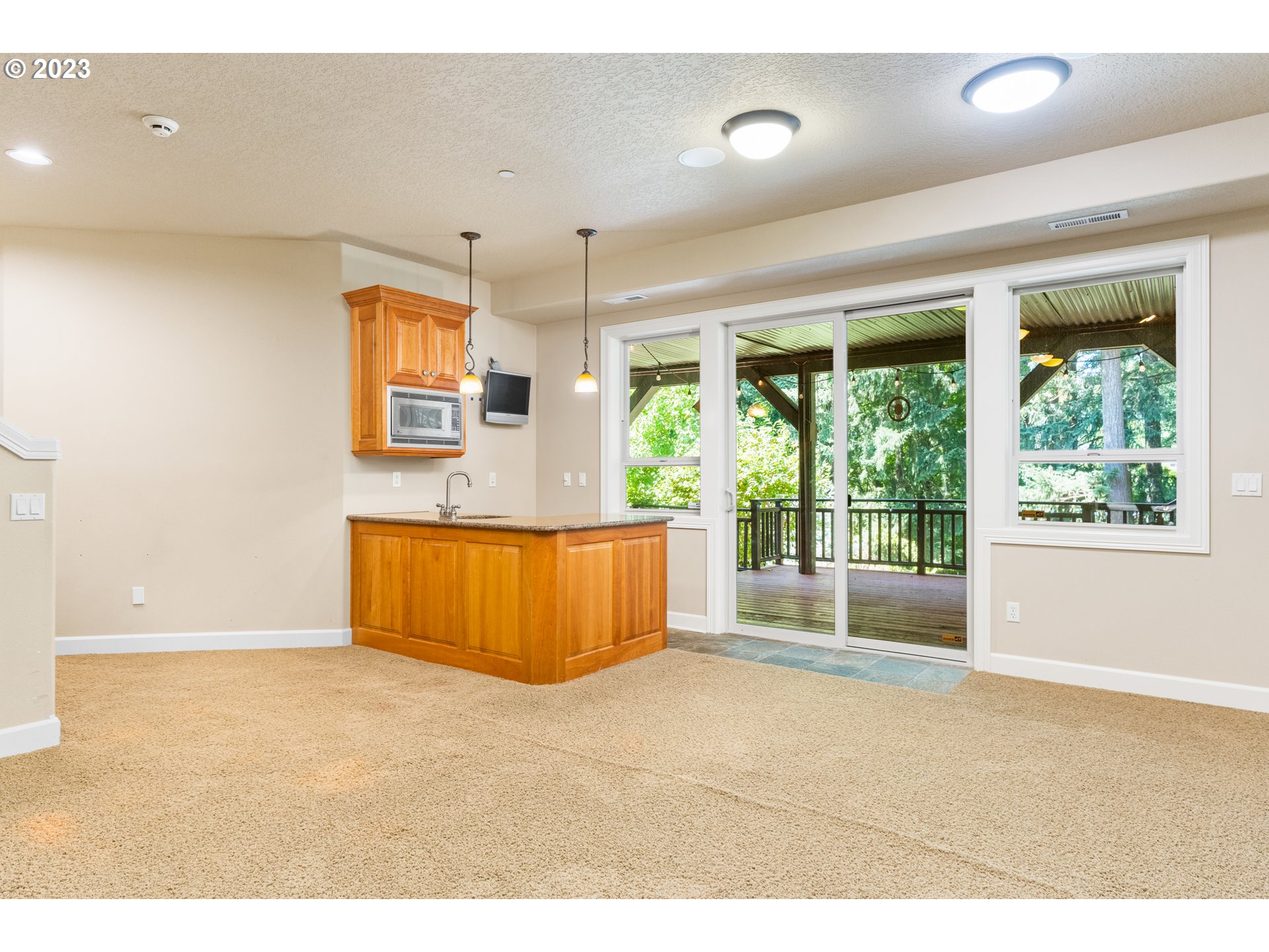 18281 Southwest Florendo Lane Beaverton, OR 97007 - Photo 20 of 47 a view of a kitchen with a sink and a window