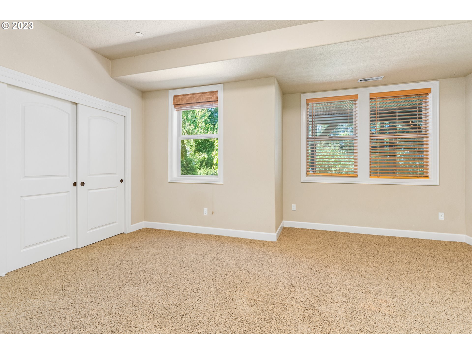 18281 Southwest Florendo Lane Beaverton, OR 97007 - Photo 24 of 47 an empty room with windows