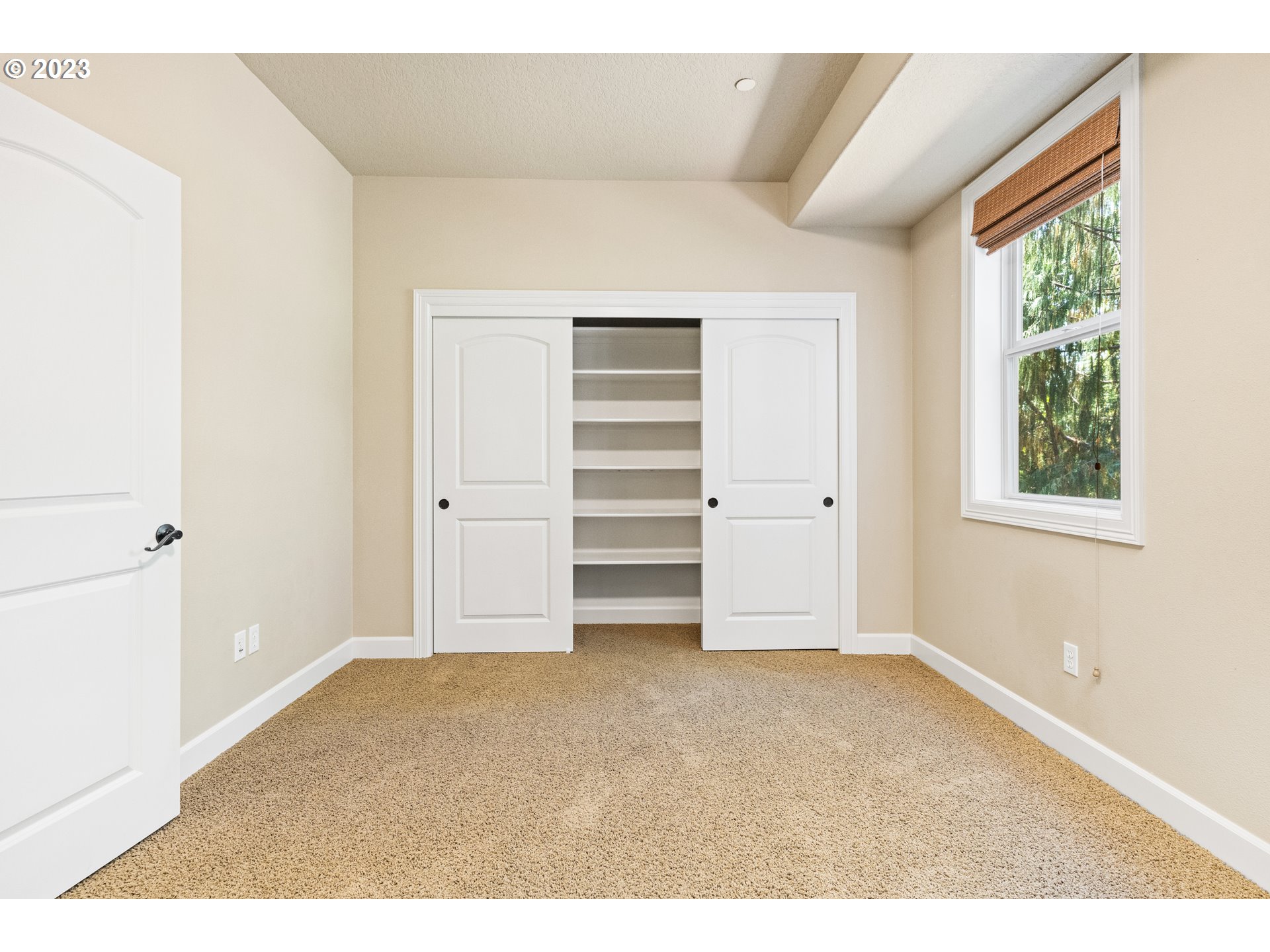 18281 Southwest Florendo Lane Beaverton, OR 97007 - Photo 25 of 47 an empty room with closet and windows