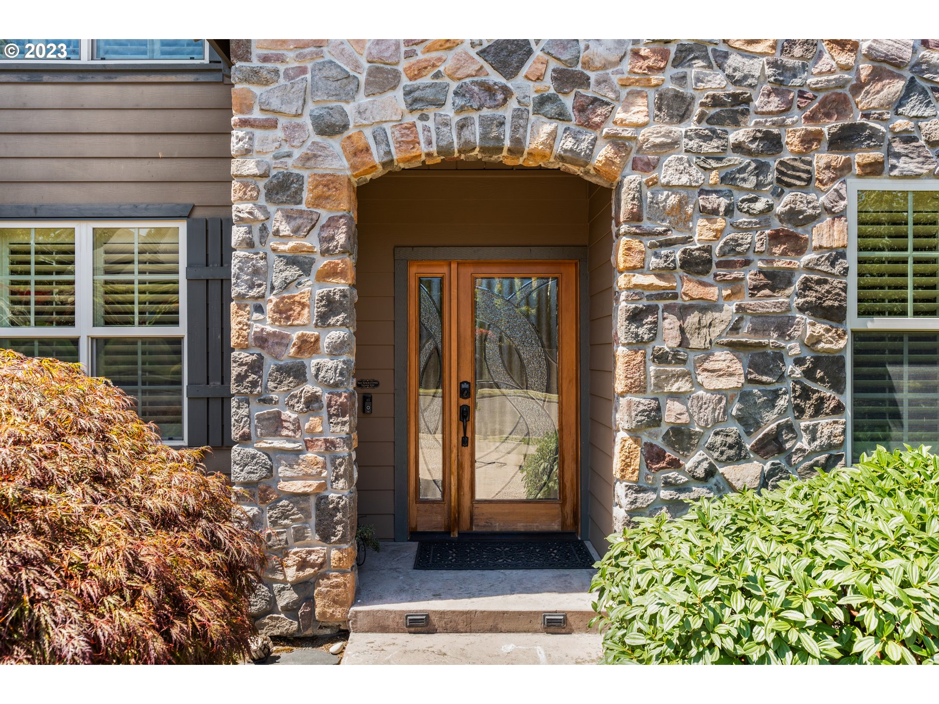 18281 Southwest Florendo Lane Beaverton, OR 97007 - Photo 3 of 47 a picture of a door of the house