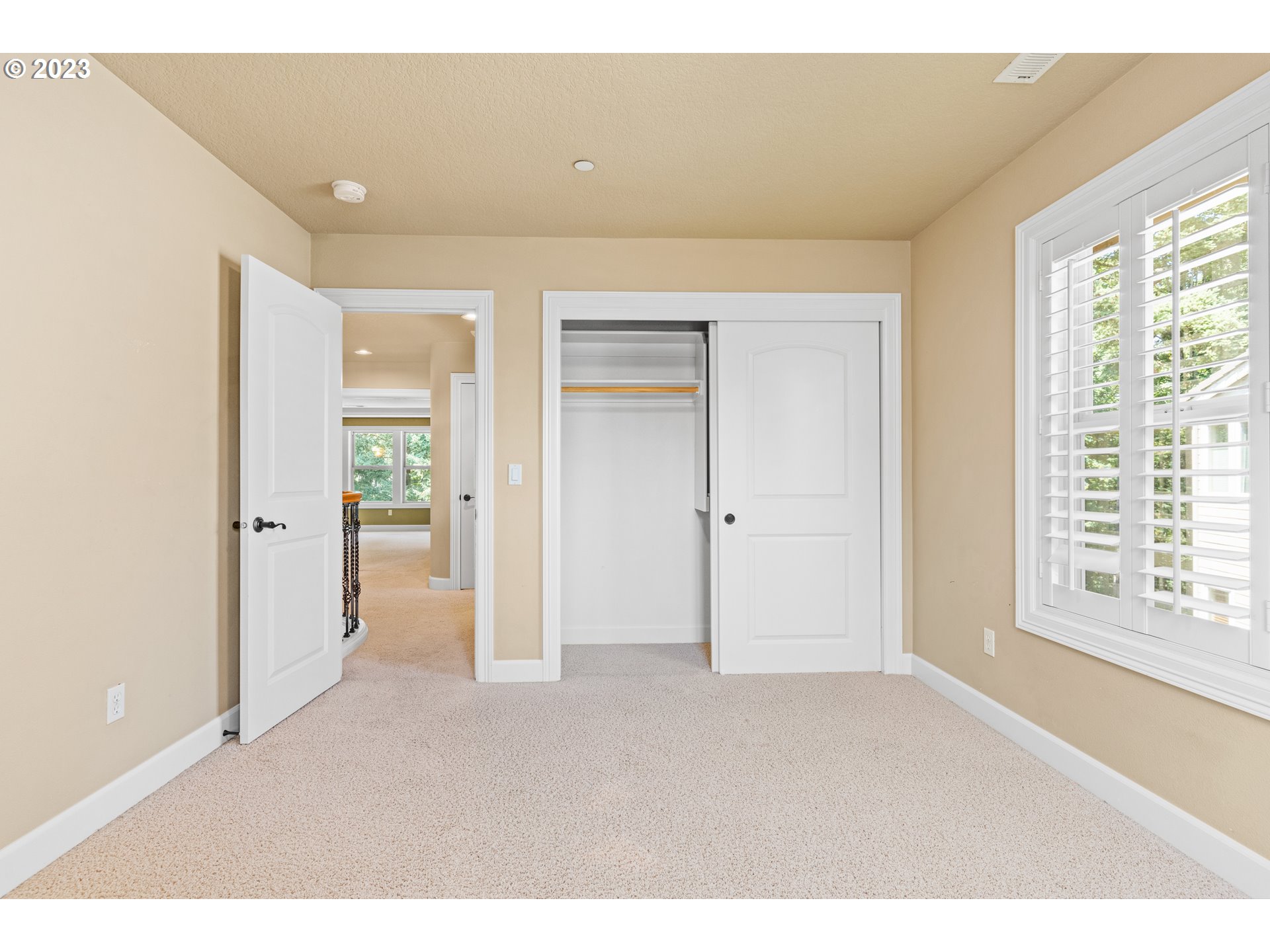 18281 Southwest Florendo Lane Beaverton, OR 97007 - Photo 37 of 47 a big room with windows and closet