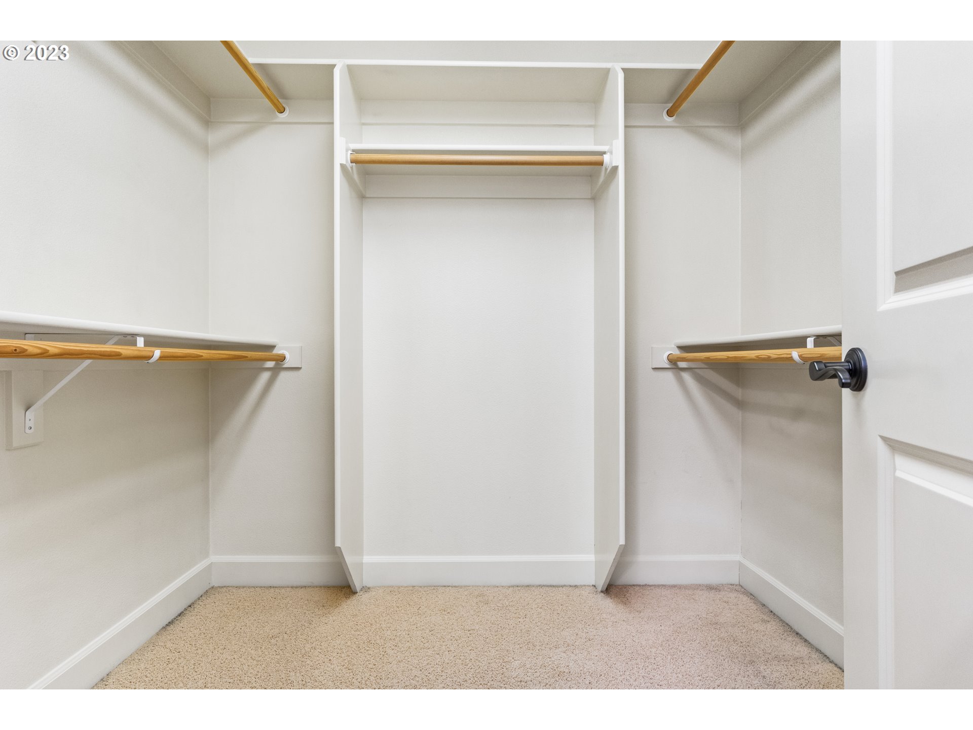 18281 Southwest Florendo Lane Beaverton, OR 97007 - Photo 42 of 47 a view of walk in closet with clothes