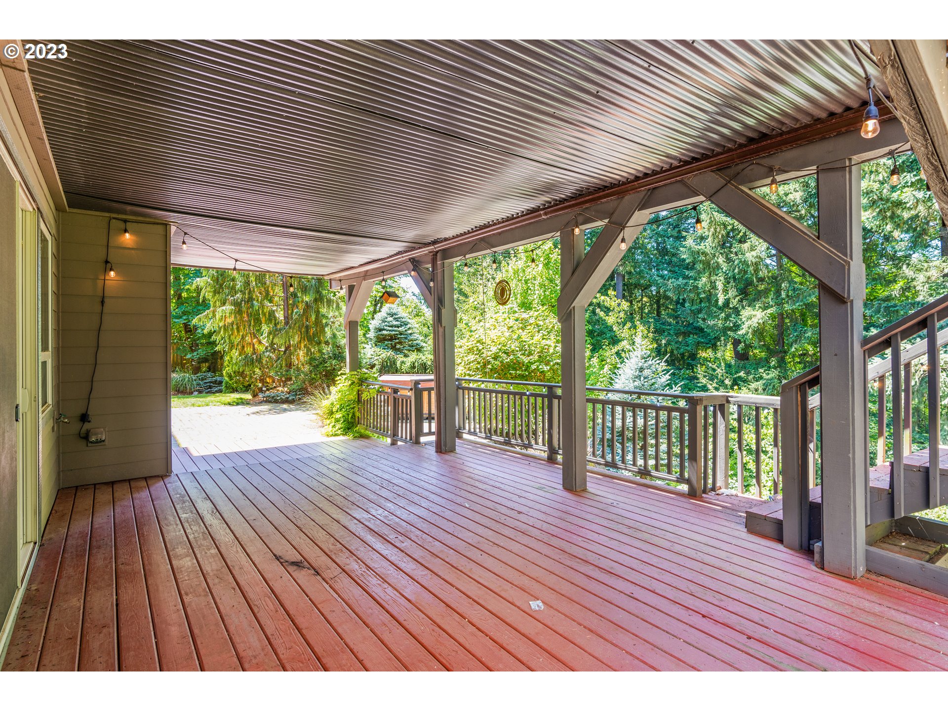 18281 Southwest Florendo Lane Beaverton, OR 97007 - Photo 43 of 47 a view of porch with wooden floor