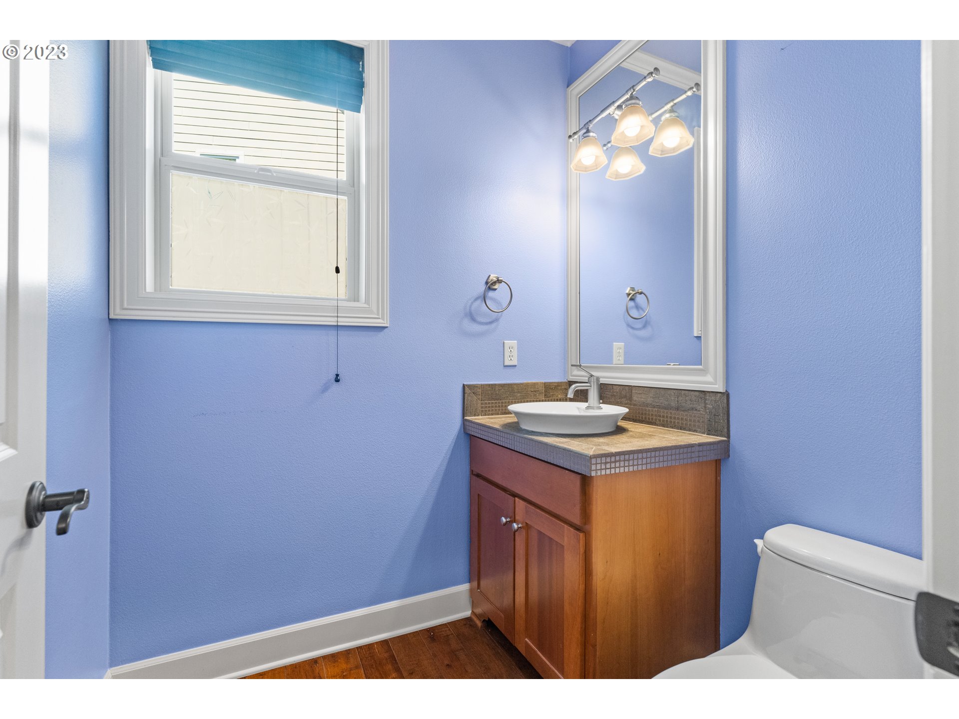 18281 Southwest Florendo Lane Beaverton, OR 97007 - Photo 9 of 47 a bathroom with a sink a vanity and a mirror
