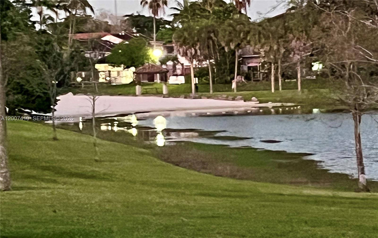 10058 Southwest 156th Court Miami, FL 33196 - Photo 16 of 16 Beach in lake