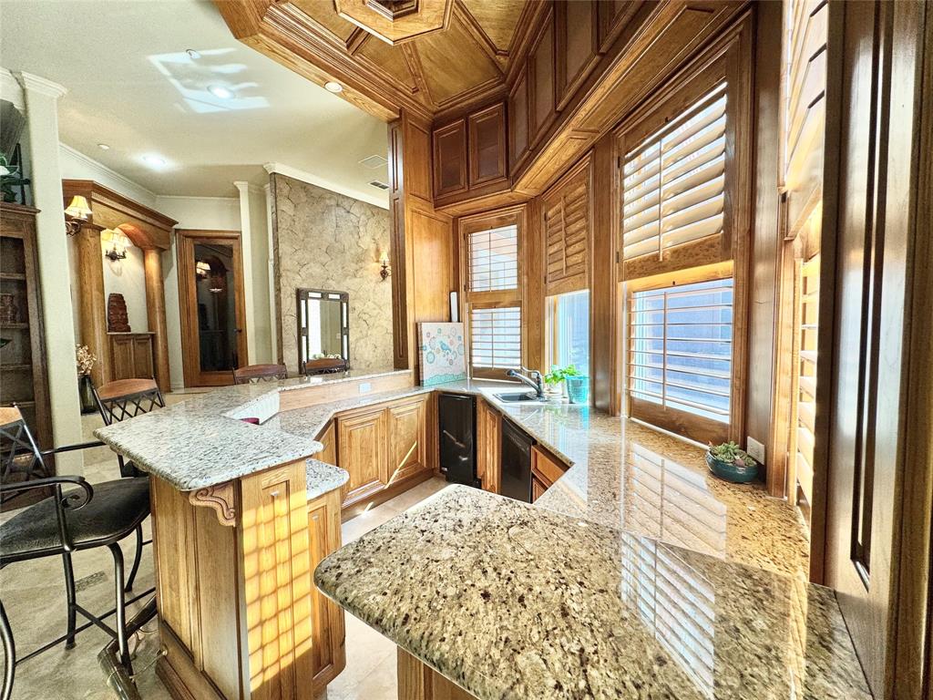 1634 Oak Ridge Drive Corinth, TX 76210 - Photo 22 of 40 a spacious bathroom with a granite countertop sink and a large mirror