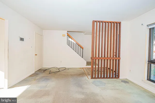 an empty room with windows