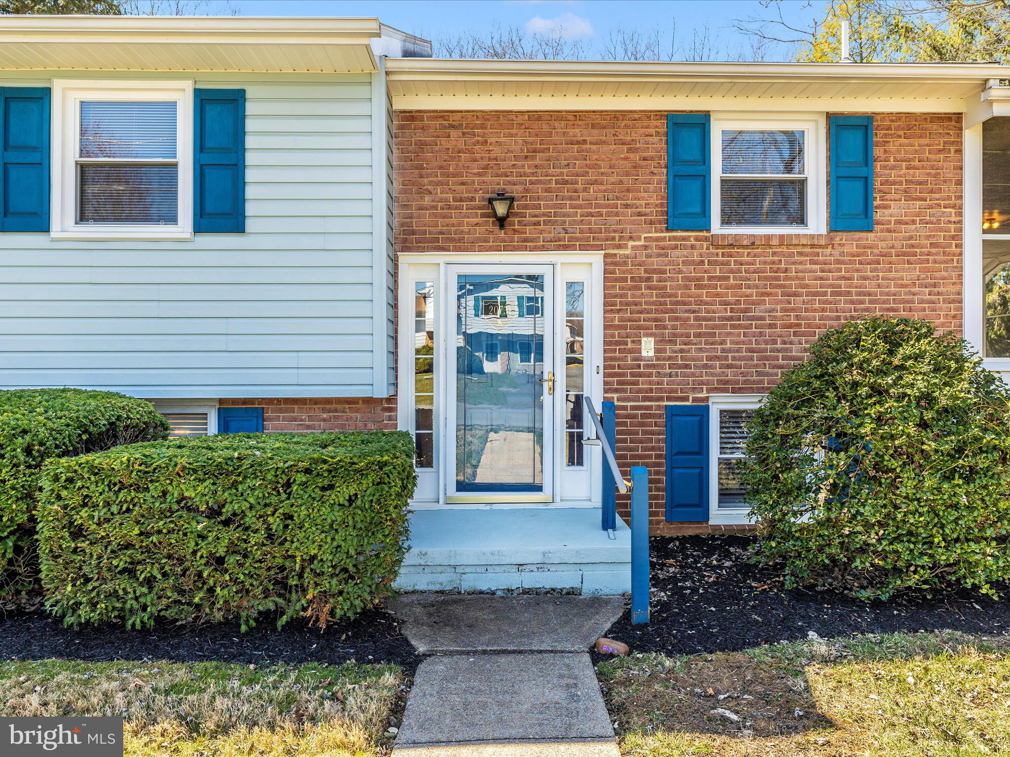 20731 Emerald Drive Hagerstown, MD 21742 - Photo 2 of 54 a front view of a house with garden
