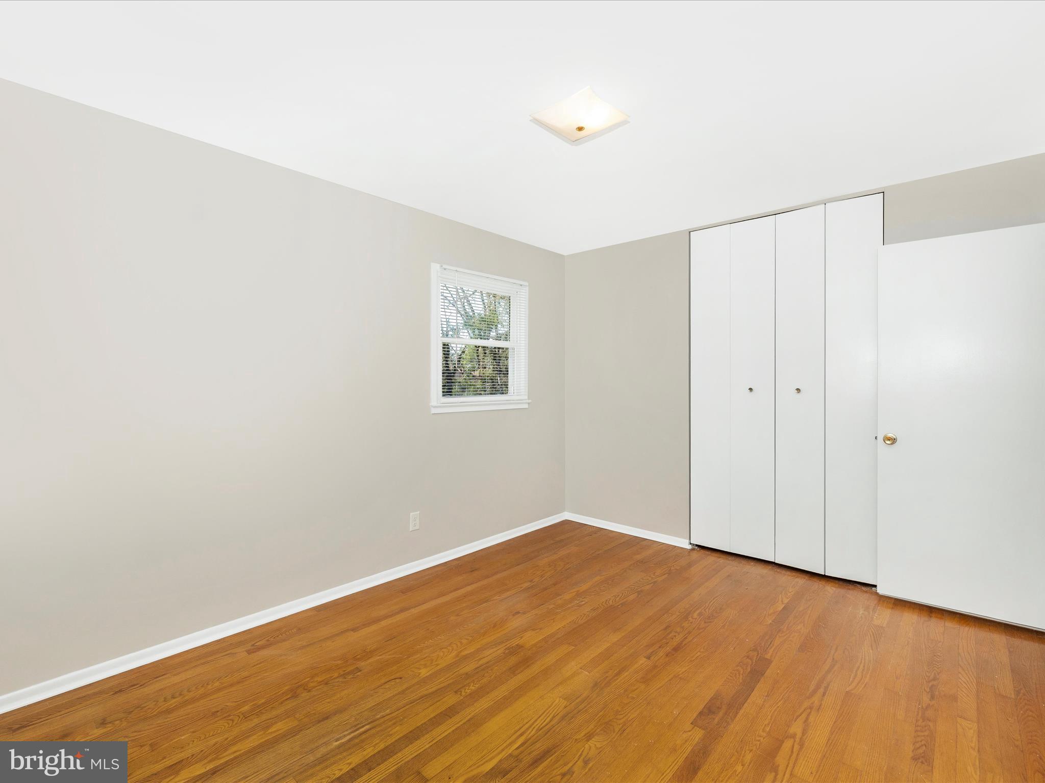 20731 Emerald Drive Hagerstown, MD 21742 - Photo 24 of 54 a view of empty room with wooden floor