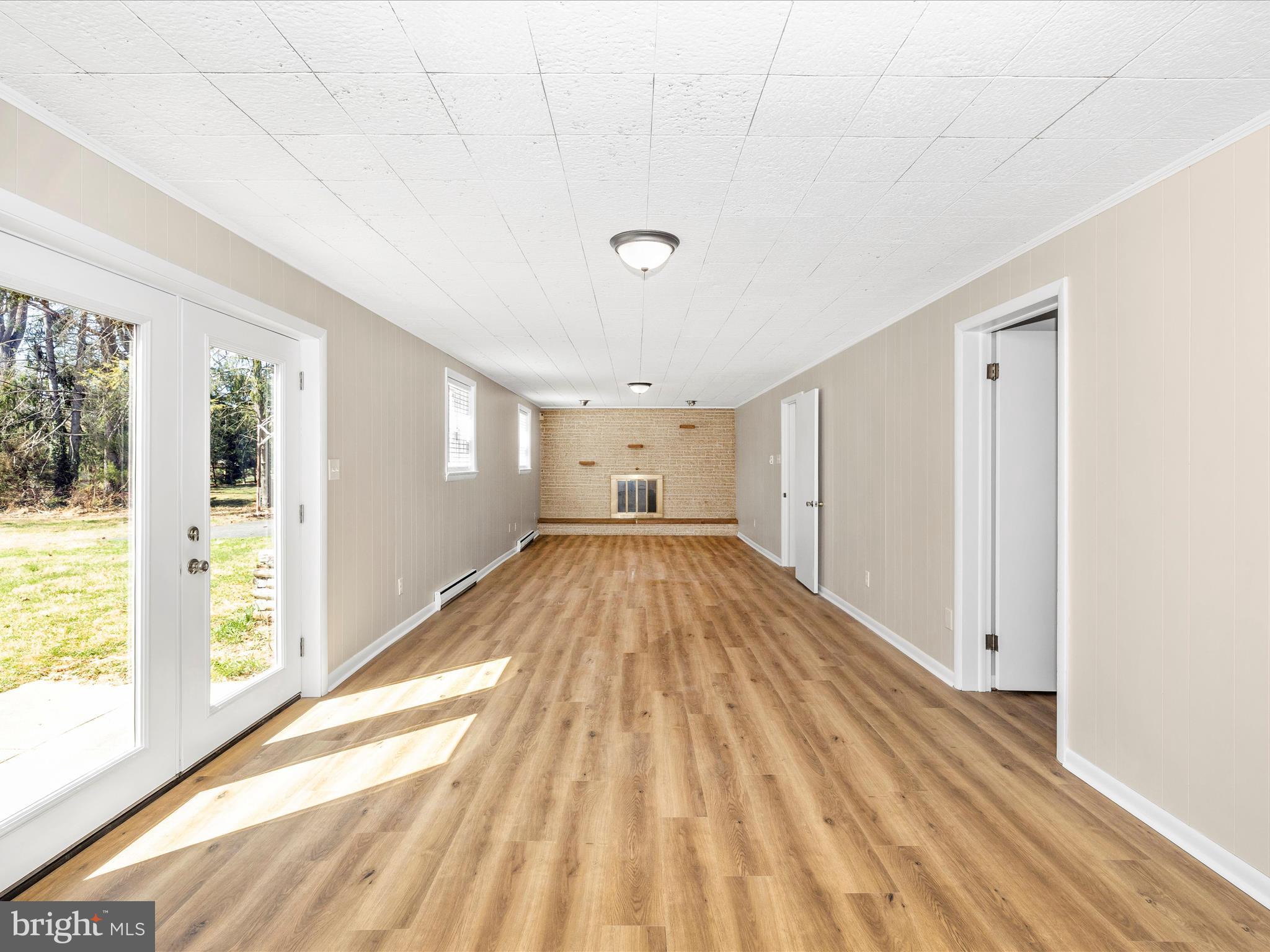 20731 Emerald Drive Hagerstown, MD 21742 - Photo 33 of 54 a view of a room with wooden floor and windows