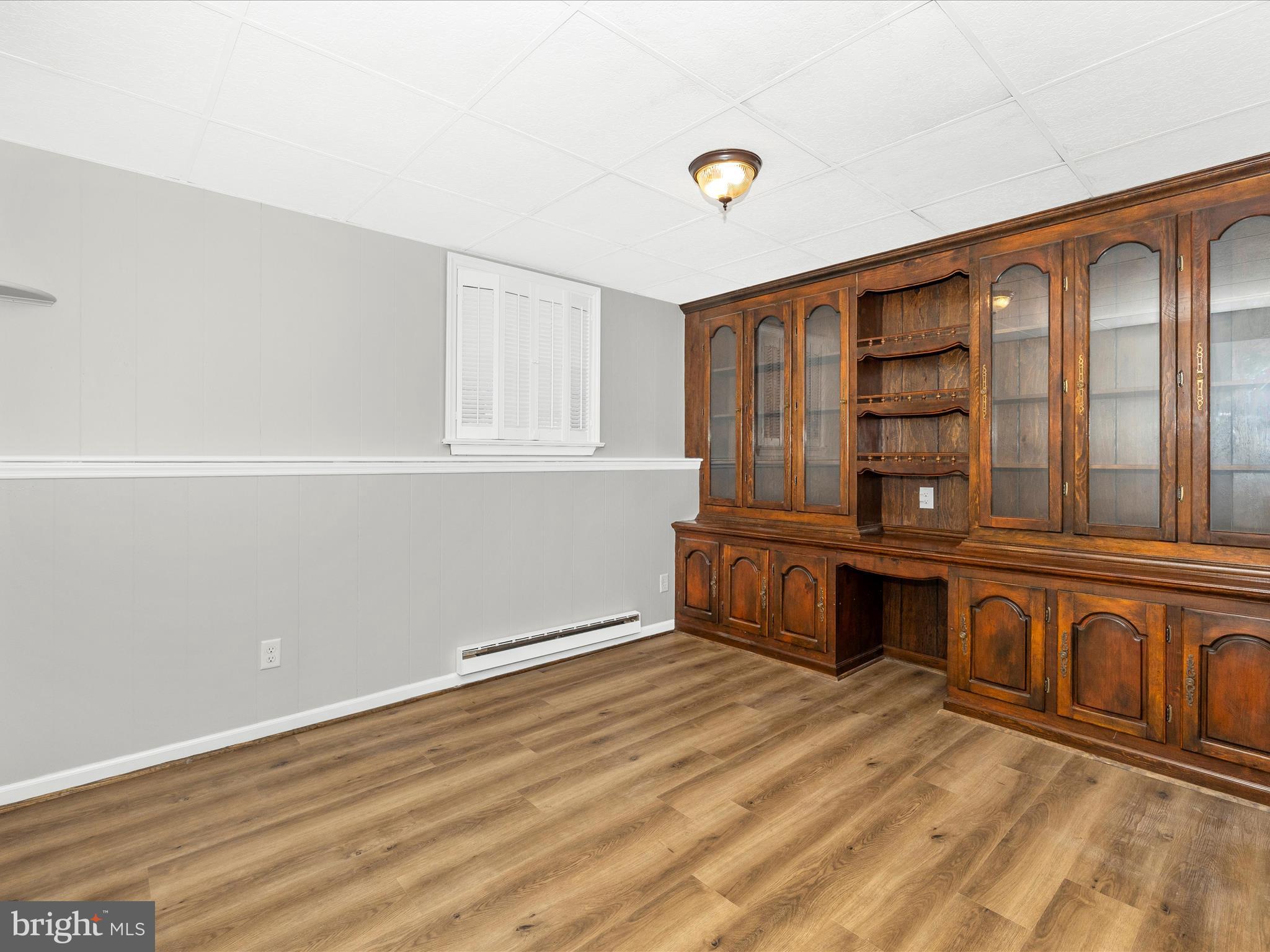 20731 Emerald Drive Hagerstown, MD 21742 - Photo 34 of 54 a view of an empty room with window and cabinet