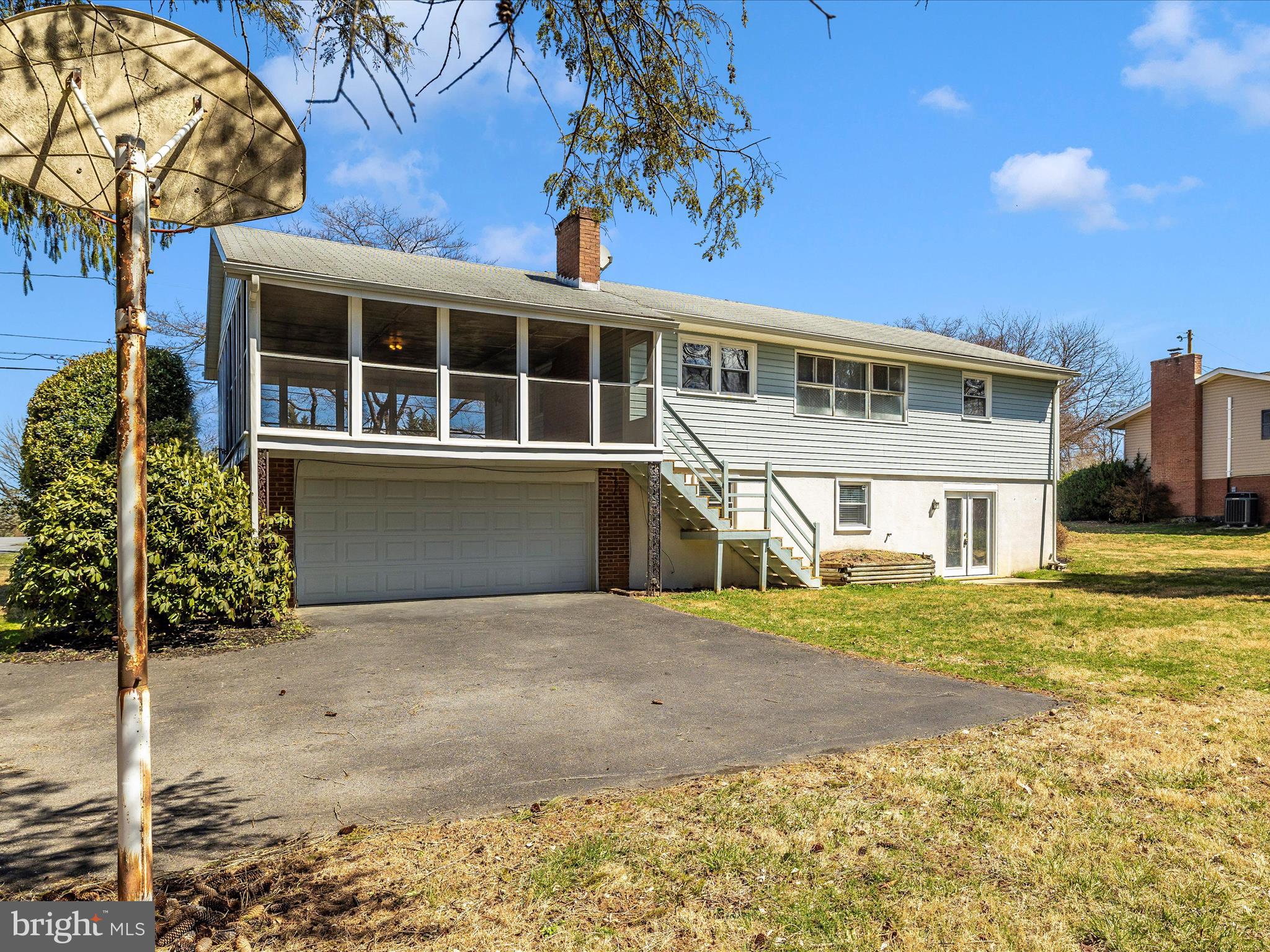 20731 Emerald Drive Hagerstown, MD 21742 - Photo 50 of 54 a front view of a house with a garden
