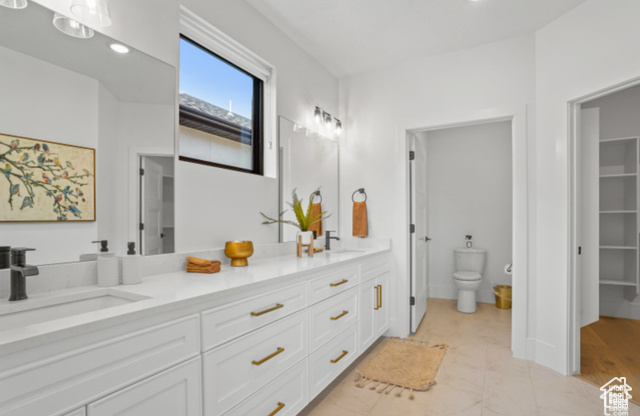 599 North Heritage Street, Unit 6 Mapleton, UT 84664 - Photo 14 of 37 Bathroom with toilet, vanity, and tile patterned flooring