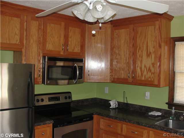 1311 Grapevine Road Sandston, VA 23150 - Photo 2 of 12 Kitchen - New cabinets and stainless steel applian