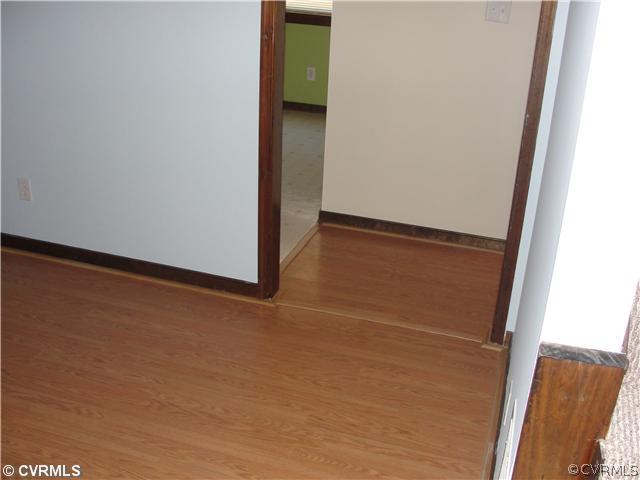1311 Grapevine Road Sandston, VA 23150 - Photo 6 of 12 Exterior Front - Hardwood floors in family room an