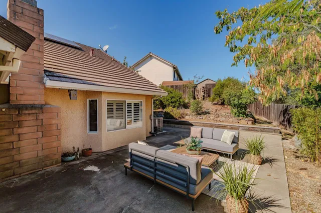 a backyard of a house with lots of green space