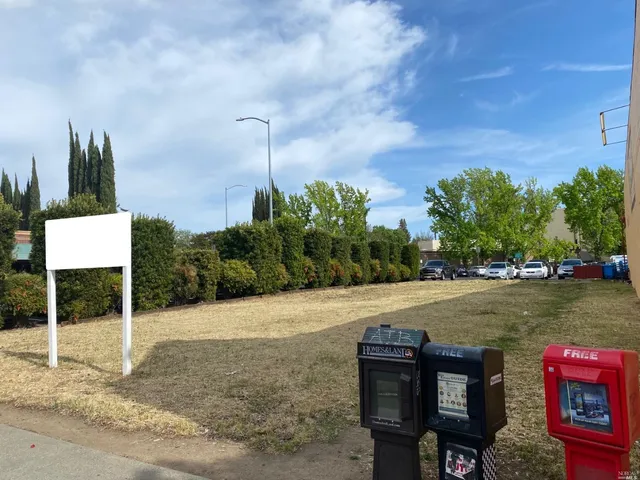 a view of a street with fire pit