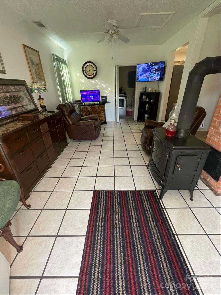 313 Summers Road Morganton, NC 28655 - Photo 11 of 36 a view of a entryway with furniture and toys