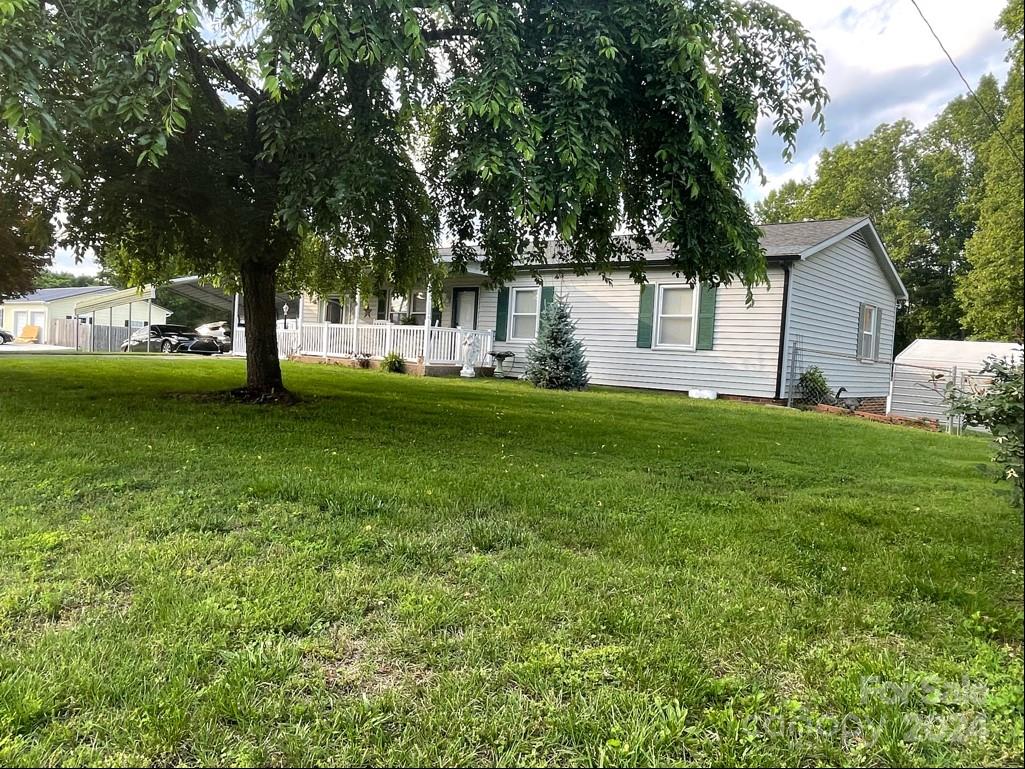 313 Summers Road Morganton, NC 28655 - Photo 3 of 36 a view of a house with a backyard