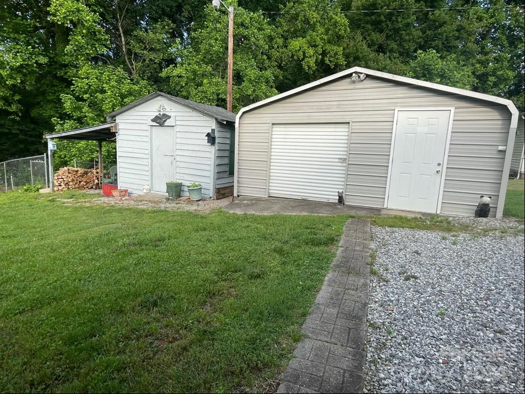 313 Summers Road Morganton, NC 28655 - Photo 31 of 36 a front view of house with yard and green space
