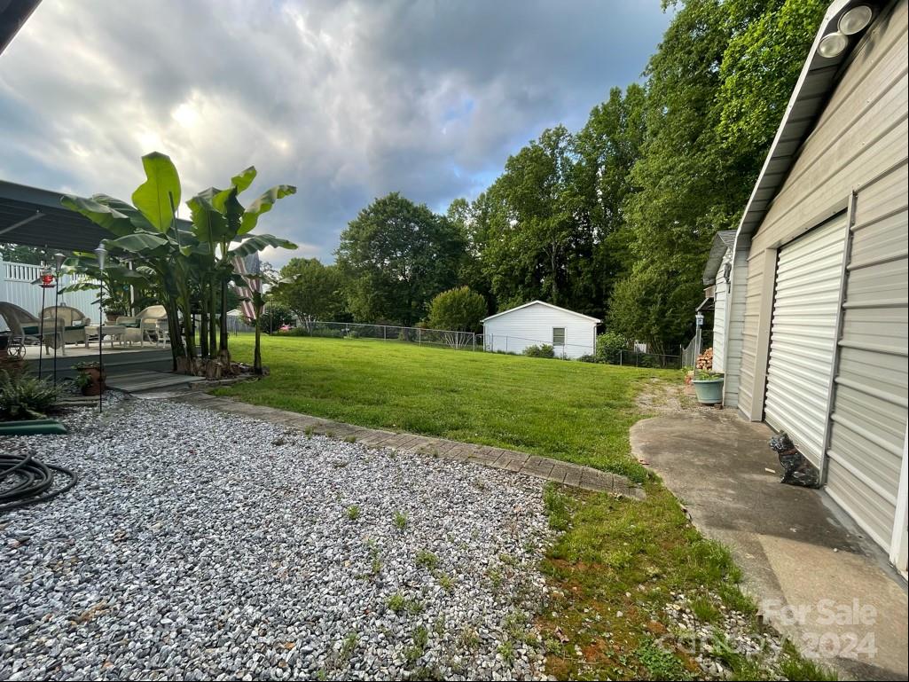 313 Summers Road Morganton, NC 28655 - Photo 32 of 36 a view of a garden with a fountain