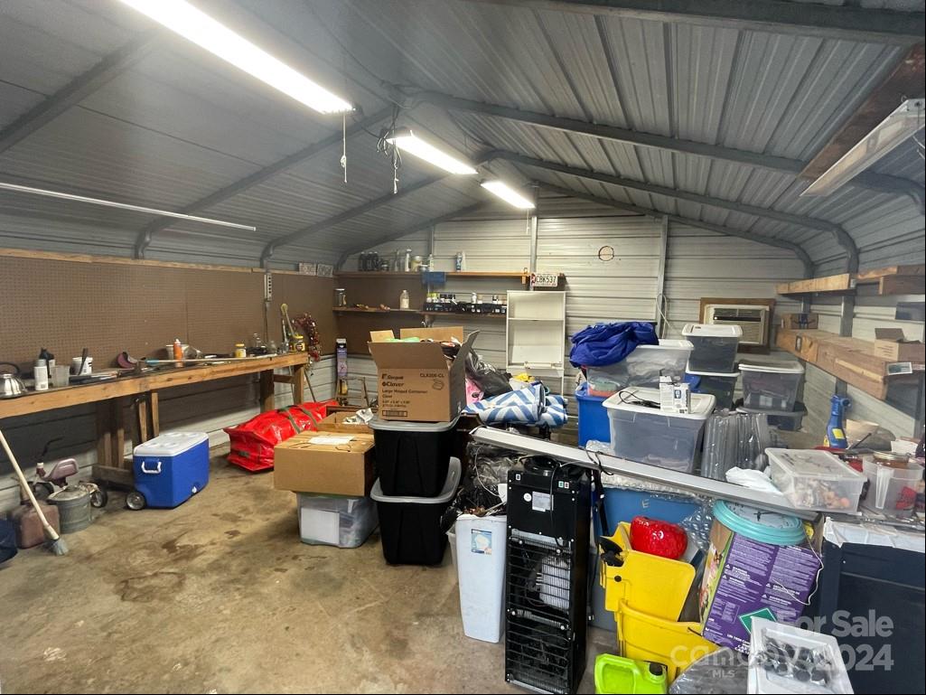 313 Summers Road Morganton, NC 28655 - Photo 33 of 36 a room with gym equipment and a view of store