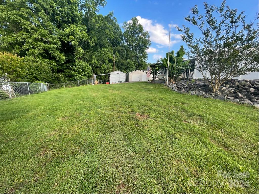 313 Summers Road Morganton, NC 28655 - Photo 34 of 36 a view of a backyard with a garden