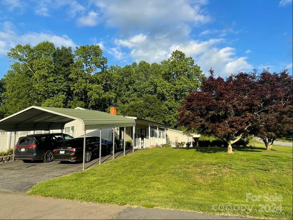 313 Summers Road Morganton, NC 28655 - Photo 5 of 36 a view of a house with a big yard