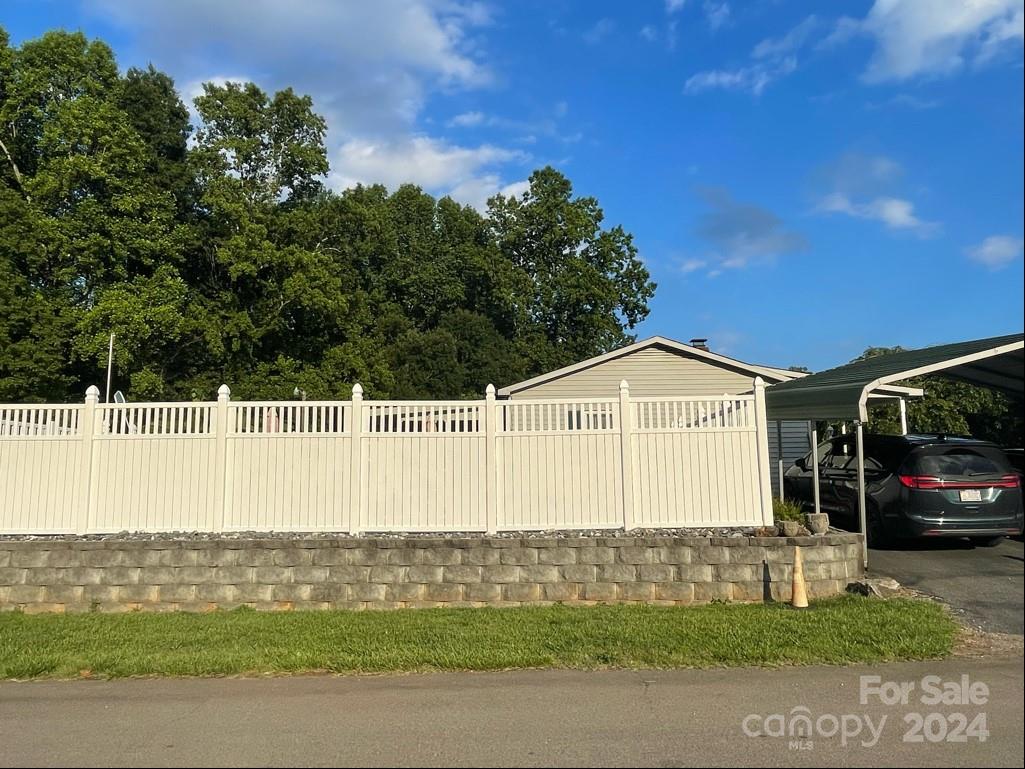 313 Summers Road Morganton, NC 28655 - Photo 8 of 36 a front view of a house with a garden