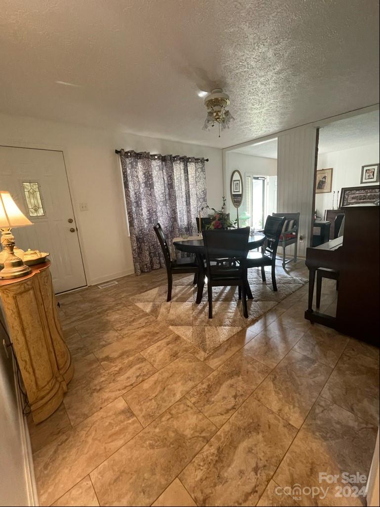 313 Summers Road Morganton, NC 28655 - Photo 9 of 36 a view of a dining room with furniture