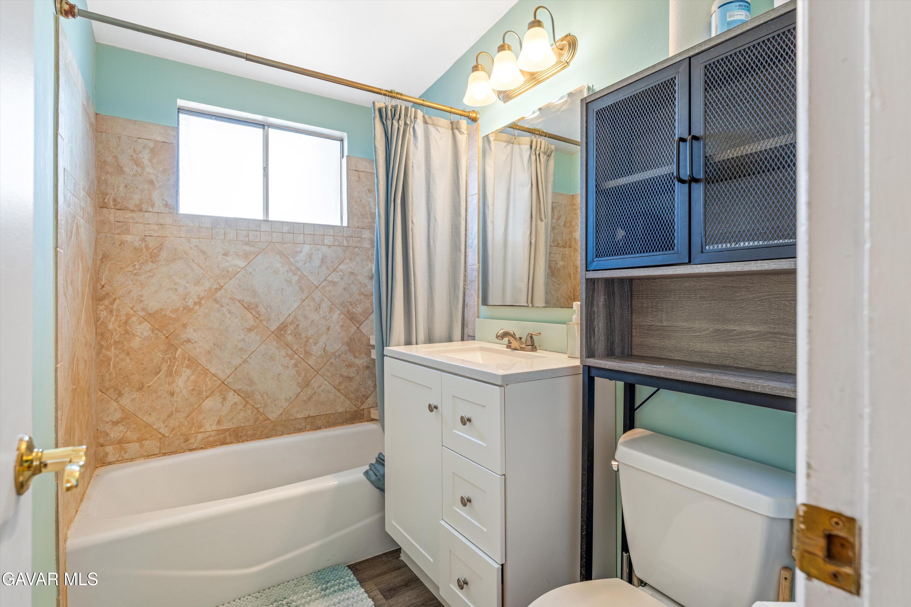 13445 Fran Street North Edwards, CA 93523 - Photo 15 of 27 a bathroom with a granite countertop sink toilet and shower