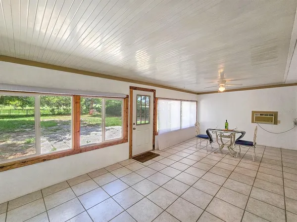 a view of a livingroom with furniture window and outside view