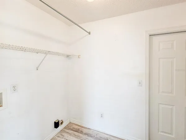 a view of small space with racks on the wall