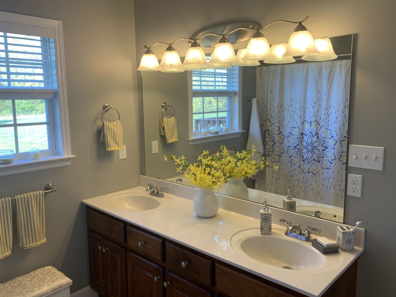 59 Falcon Drive Manchester, TN 37355 - Photo 13 of 20 a bathroom with a double vanity sink and a mirror