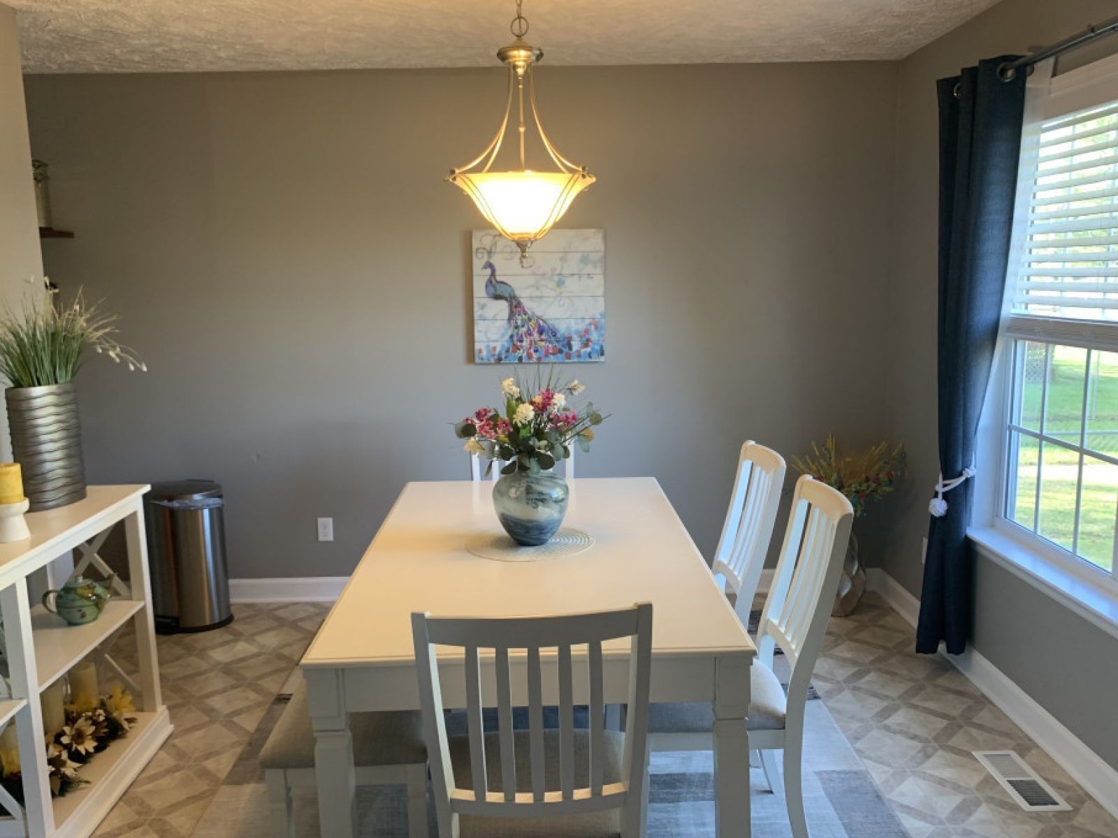 59 Falcon Drive Manchester, TN 37355 - Photo 8 of 20 a view of a dining room with furniture and a chandelier