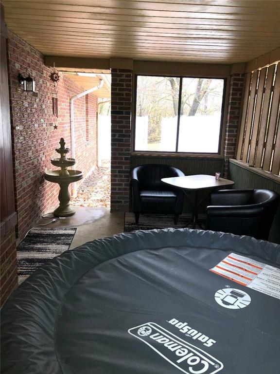 96 Crestvue Road Washington, PA 15301 - Photo 21 of 25 Side Porch off kitchen, adjacent to courtyard area. Covered; private oasis all year round.