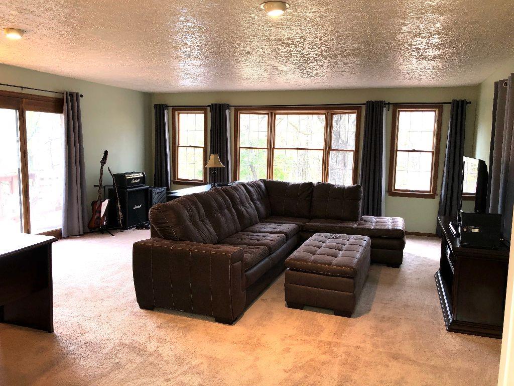 96 Crestvue Road Washington, PA 15301 - Photo 9 of 25 Main Livingroom is Enormous. Bay Window in center of wall of windows. Balcony off left side.