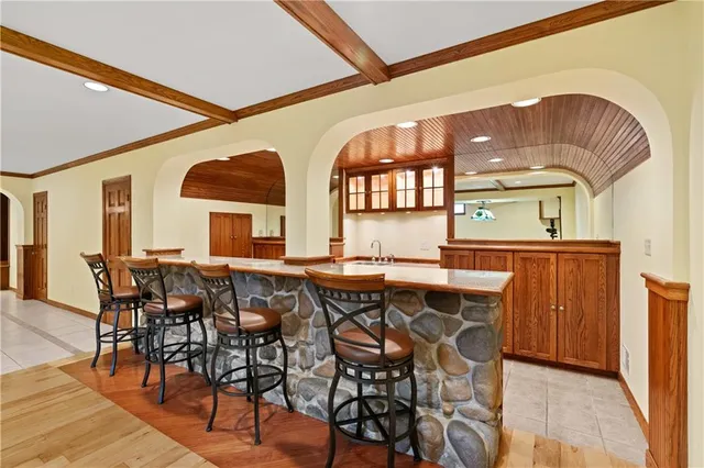 a view of a dining room with furniture and window