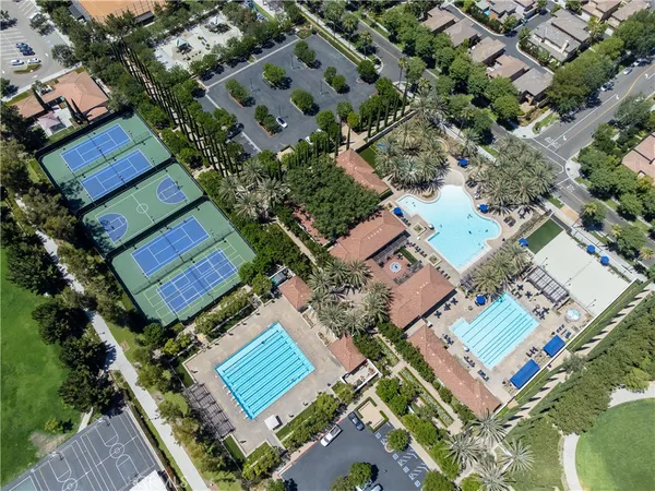 an aerial view of a house with a garden