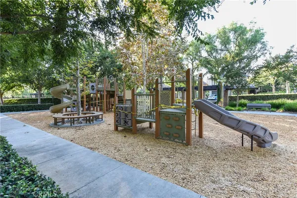 a building view with couches and a fire pit