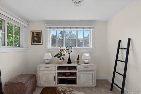 a view of room with window and hardwood floor