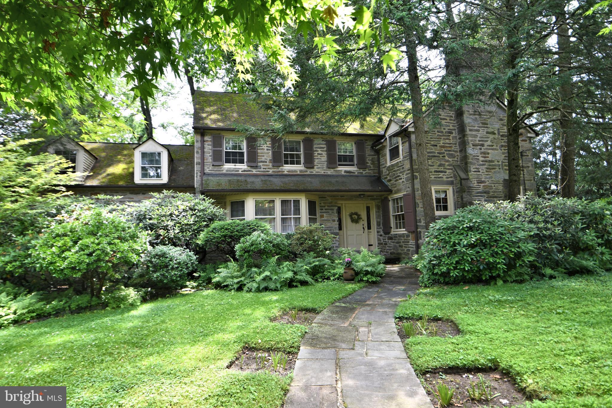 120 Hewett Road Wyncote, PA 19095 - Photo 2 of 44 a front view of a house with a yard