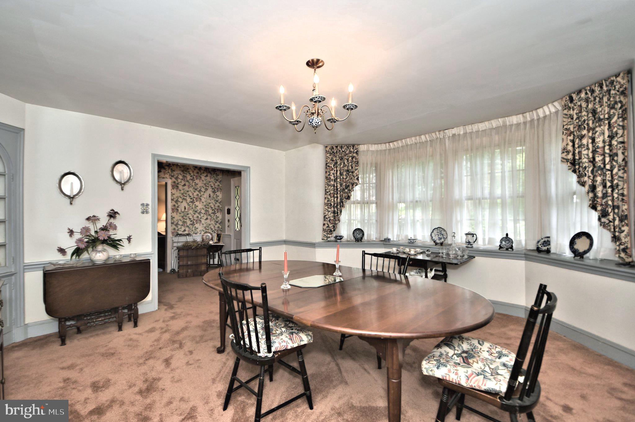 120 Hewett Road Wyncote, PA 19095 - Photo 13 of 44 a view of a a dining room with furniture and window