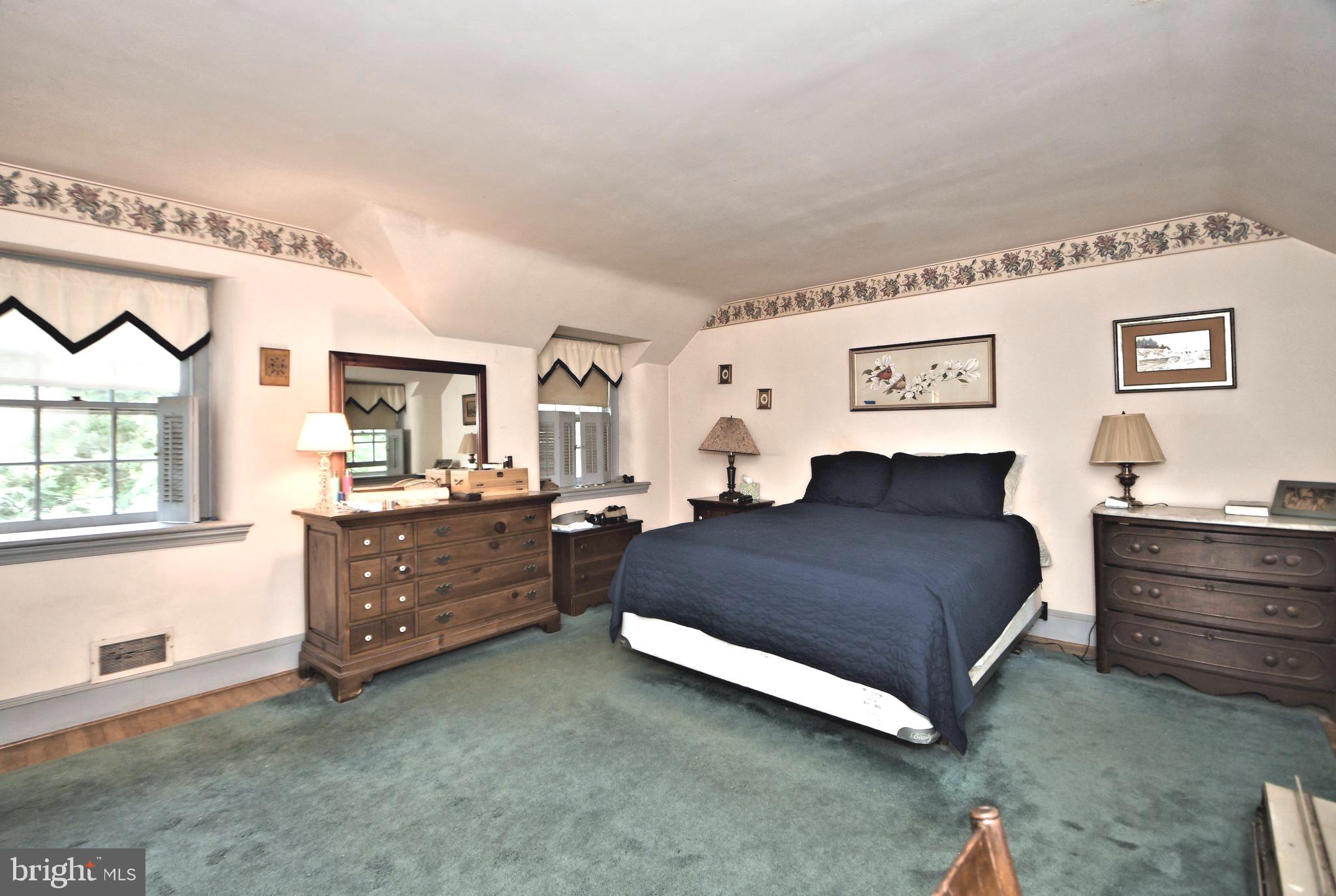 120 Hewett Road Wyncote, PA 19095 - Photo 16 of 44 a bedroom with a bed and a dresser