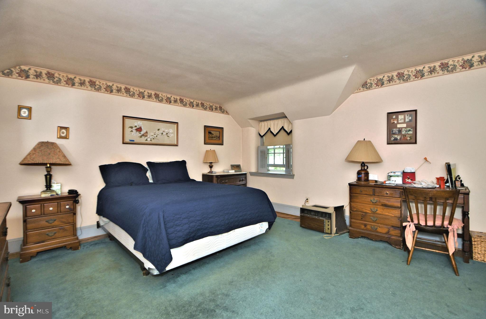 120 Hewett Road Wyncote, PA 19095 - Photo 17 of 44 a spacious bedroom with a bed and a desk
