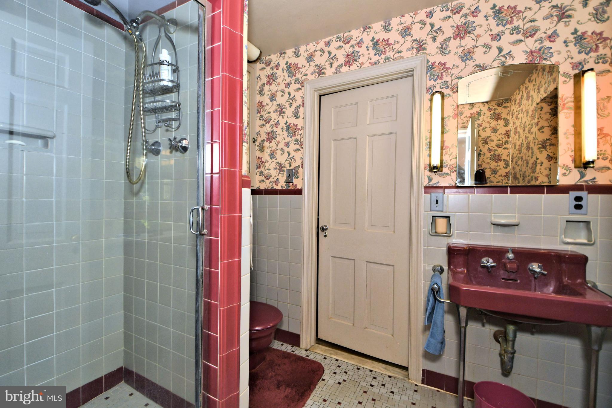 120 Hewett Road Wyncote, PA 19095 - Photo 18 of 44 a bathroom with a sink a mirror and a shower